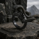 bague draconique noire tête sculptée