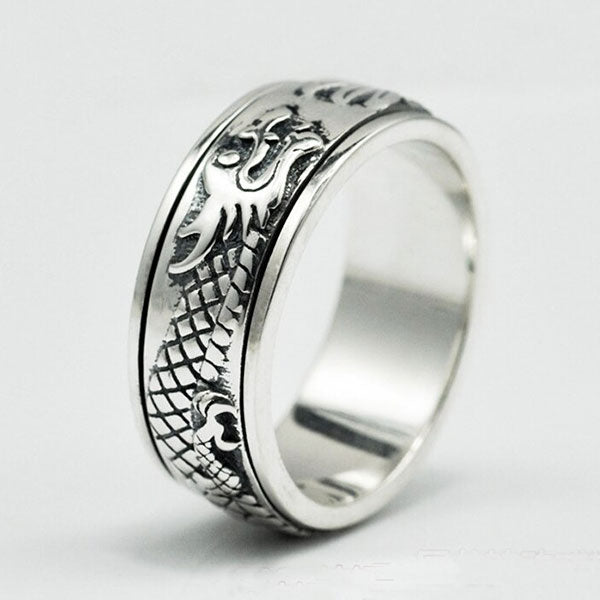 Bague dragon rotatif