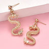 Boucle d'oreille dragon or