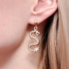 Boucle d'oreille dragon or