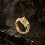 bague draconique or tête sculptée