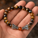 bracelet mystique perle ambrée dragon argenté